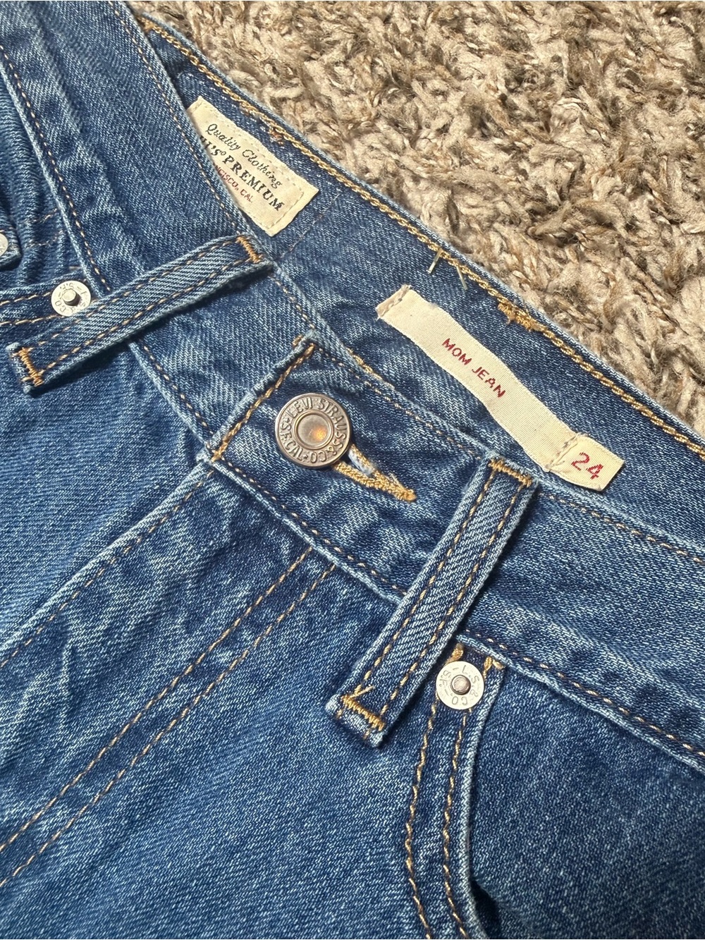 Levi's Premium High Rise Mom Jeans Bow-Side Cutout with "Big E"